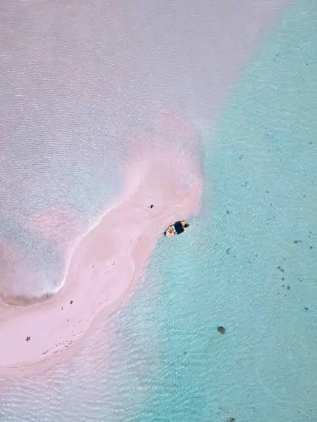 Rangiroa pink sand beach at blue lagoon from drone