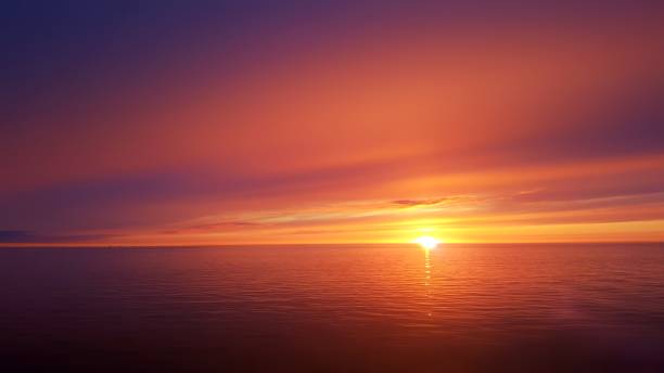 coucher de soleil de l’océan - horizon photos et images de collection