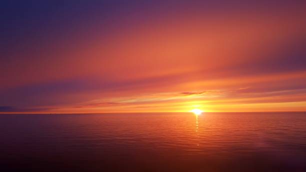 tramonto sull'oceano - horizon over water environment vacations nature foto e immagini stock