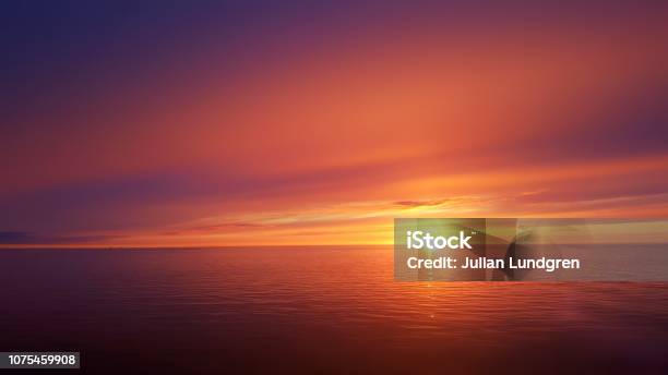 Ocean Sunset Stock Photo - Download Image Now - Sunset, Sea, Horizon