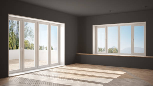 nowoczesna pusta przestrzeń z dużymi panoramicznymi oknami i drewnianą podłogą, minimalistyczna biała i szara architektura wystroju wnętrz - loft apartment window indoors domestic room zdjęcia i obrazy z banku zdjęć