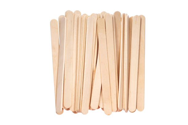 istock Ice cream wooden sticks on white background 1075469962