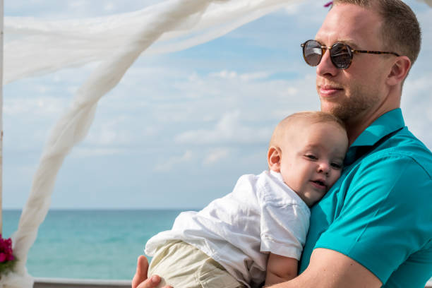 istock A godfather and his young nephew in a wedding celebration 1075472738