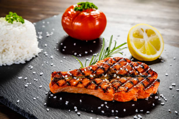 istock Fish dish - salmon steak and vegetables 1075476012