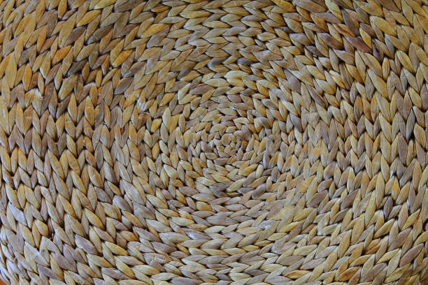 istock Woven reed in circular spiral shape texture for background 1075479782
