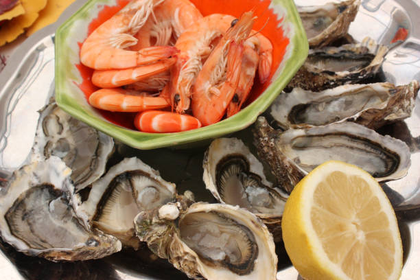istock Gambas and Hollow oysters seasoned with lemon 1075484792