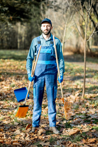 istock Professional sweeper in the garden 1075495756