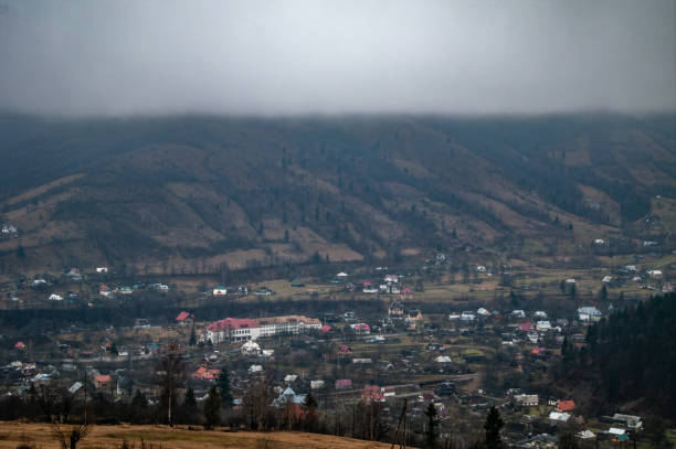 istock Foggy day in a mountain village 1075498156