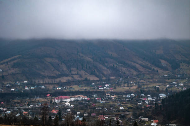 istock Foggy day in a mountain village 1075498430
