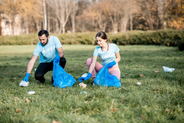 istock Volunteers cleaning public park from the rubbish 1075498444