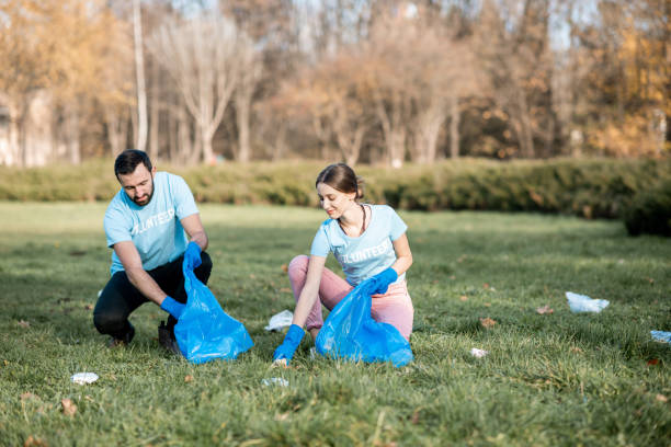 istock Volunteers cleaning public park from the rubbish 1075498500