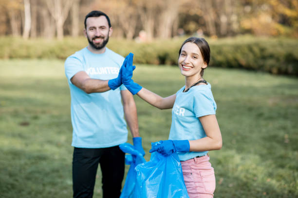 istock Happy volunteers in the paark 1075498810