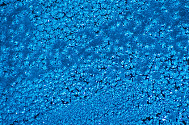 istock frost on the window, winter pattern on the glass 1075505456