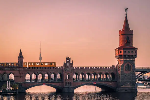 Oberbaum Bridge in Berlin at Sunset with View on the  Television Tower