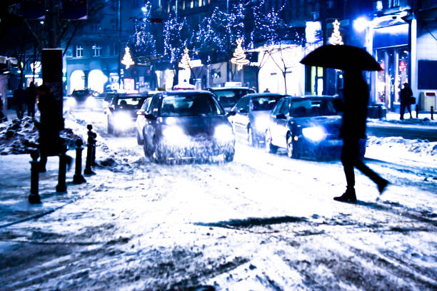 istock Blurry snowy city night traffic 1075512994