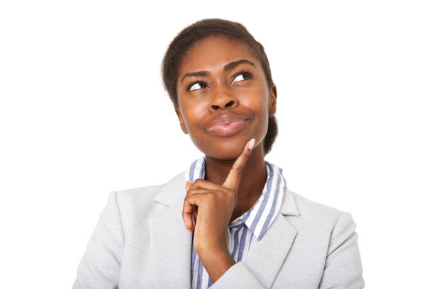 istock Close up attractive young black woman thinking and looking up 1075520736