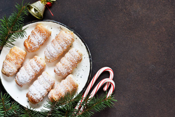 istock Ingredients for baking. Christmas card with decorations on concrete background. Christmas baking, cooking process. 1075529076