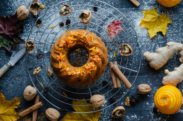 istock Carrot cake on grid, with ingredients. Flat lay. Top view. 1075550880