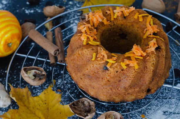 istock Carrot cake on grid, with ingredients. Flat lay. Top view. 1075550992