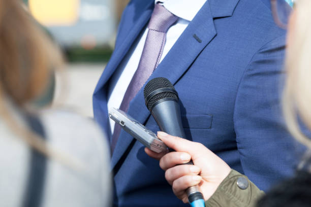 istock Journalist making press interview with politician or business person 1075555554