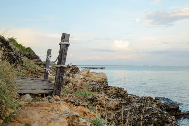 istock Wooden bridge along coastline, Rayong, Thailand 1075563174