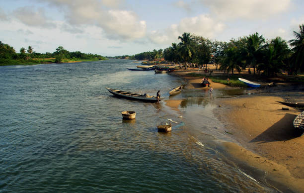 Volta river life and landscape fishing people at southern ghana, where Volta river enters the sea. west africa coast photos stock pictures, royalty-free photos & images