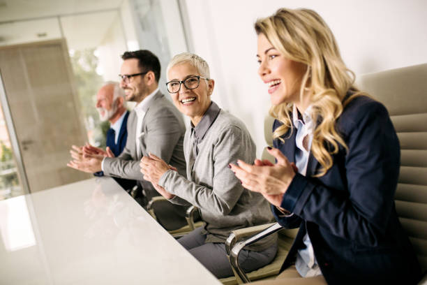 istock Business team applauding in the office 1075567340