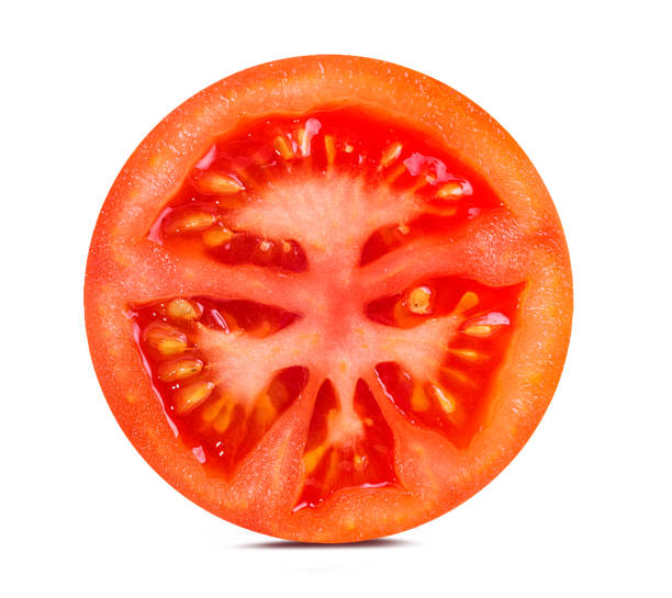 istock Sliced tomato isolated on white background with clipping path 1075579420