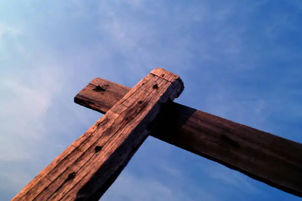 Wooden cross  with blue sky image