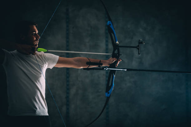istock Young archer with the bow and arrow 1075588020