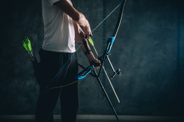 istock Young archer with the bow and arrow 1075589020