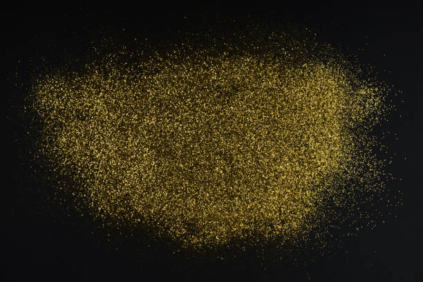istock Creative layout made of golden glitter with copy space on black 1075592804