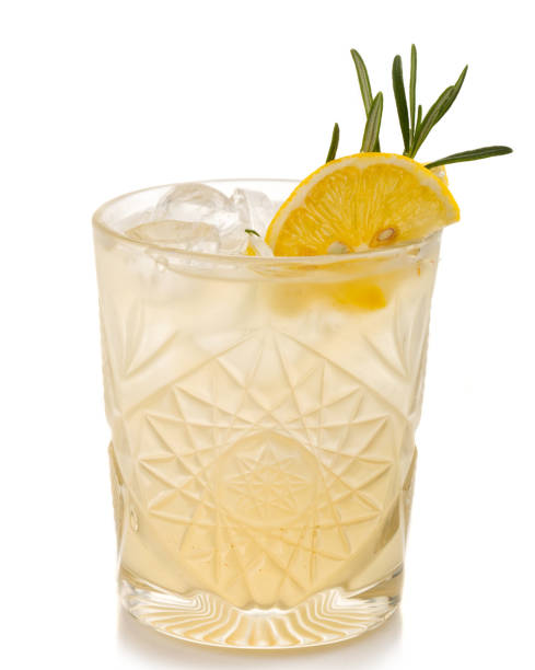 istock Alcohol coctkail with lemon and spices isolated on white 1075599032