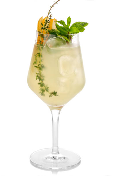 istock Alcohol coctkail with fresh mint and pear isolated on white 1075599058