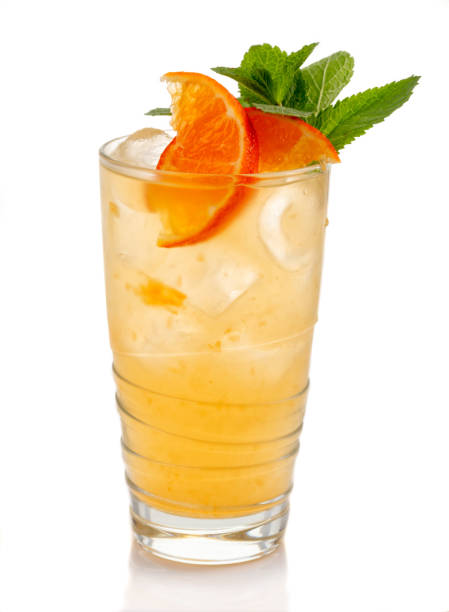 Alcohol coctkail with fresh mint and tangerine isolated on white
