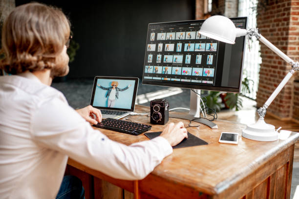 istock Photographer working on the computers indoors 1075599976