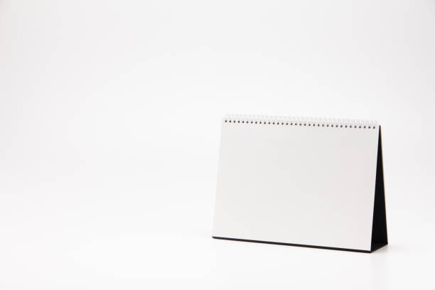 istock A white paper calendar stands on the table in photo 1075600964