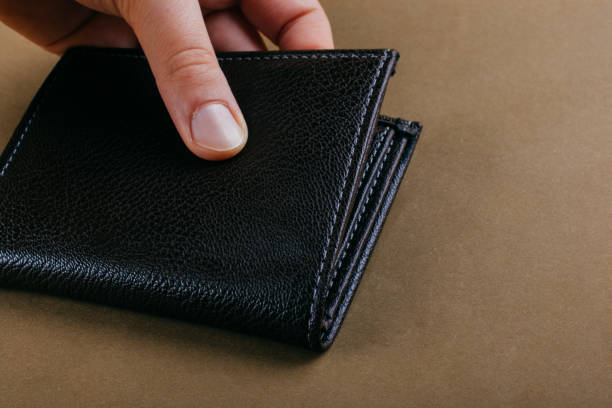 istock Wallet in hand  saving and finance concept 1075603440