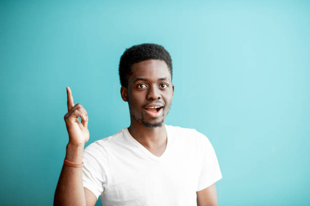 istock African man's portrait on the colorful background 1075605792