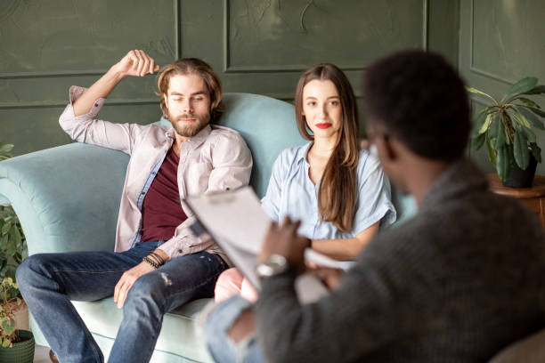 istock Young couple during a psychological session with psychologist 1075608824