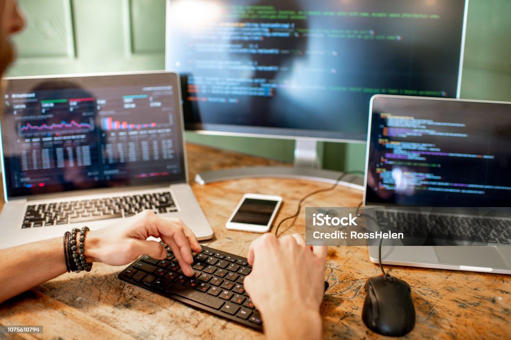 Programmer Working With Program Code Stock Photo - Download Image Now ...