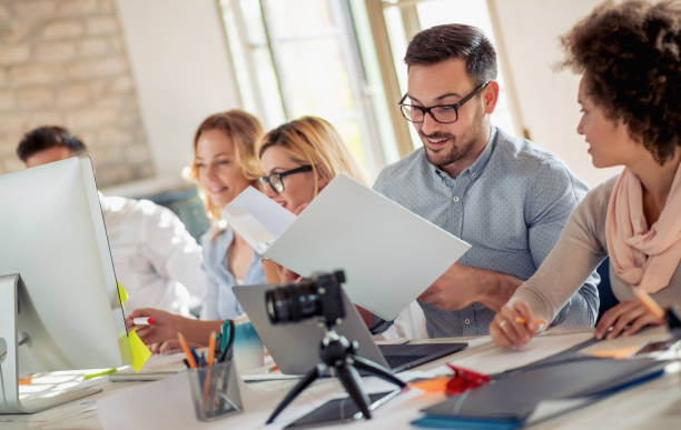 istock Business team sitting in office and planning work 1075617686
