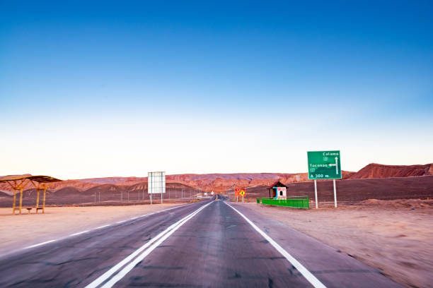 Road bend across the desert by the Andes Mountains in Mendoza, Argentina.