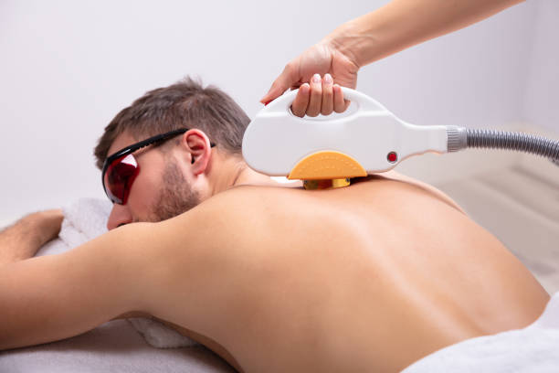 istock Man Receiving Laser Epilation Treatment 1075627916