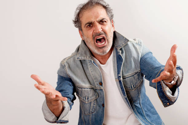 istock angry man yelling portrait 1075644030