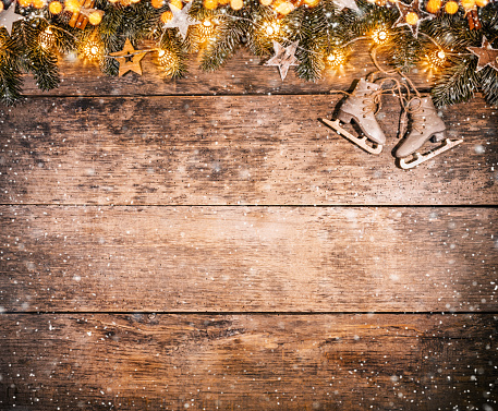 Decorative Christmas rustic background on wooden planks. Celebration and holiday concept. Free space for text.