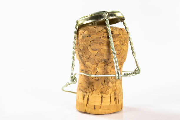 istock Cork from champagne on a kitchen table. Good New Year's drinks and great fun. Light background. 1075647146