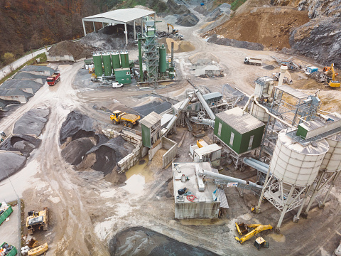 Large conveyor belt in open pit mine for ore transportation