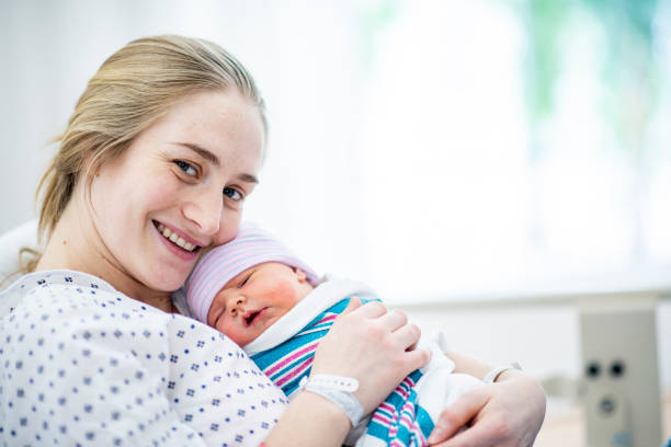 istock Newborn and mother 1075704708