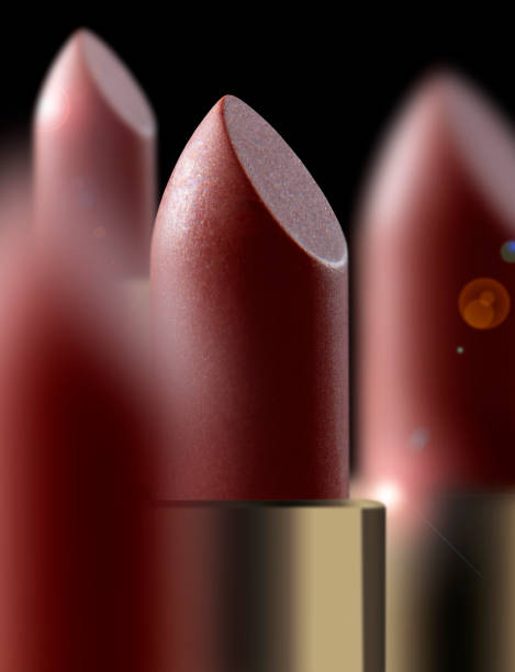 istock lipsticks with blurs and lens flare on a black background 1075708568
